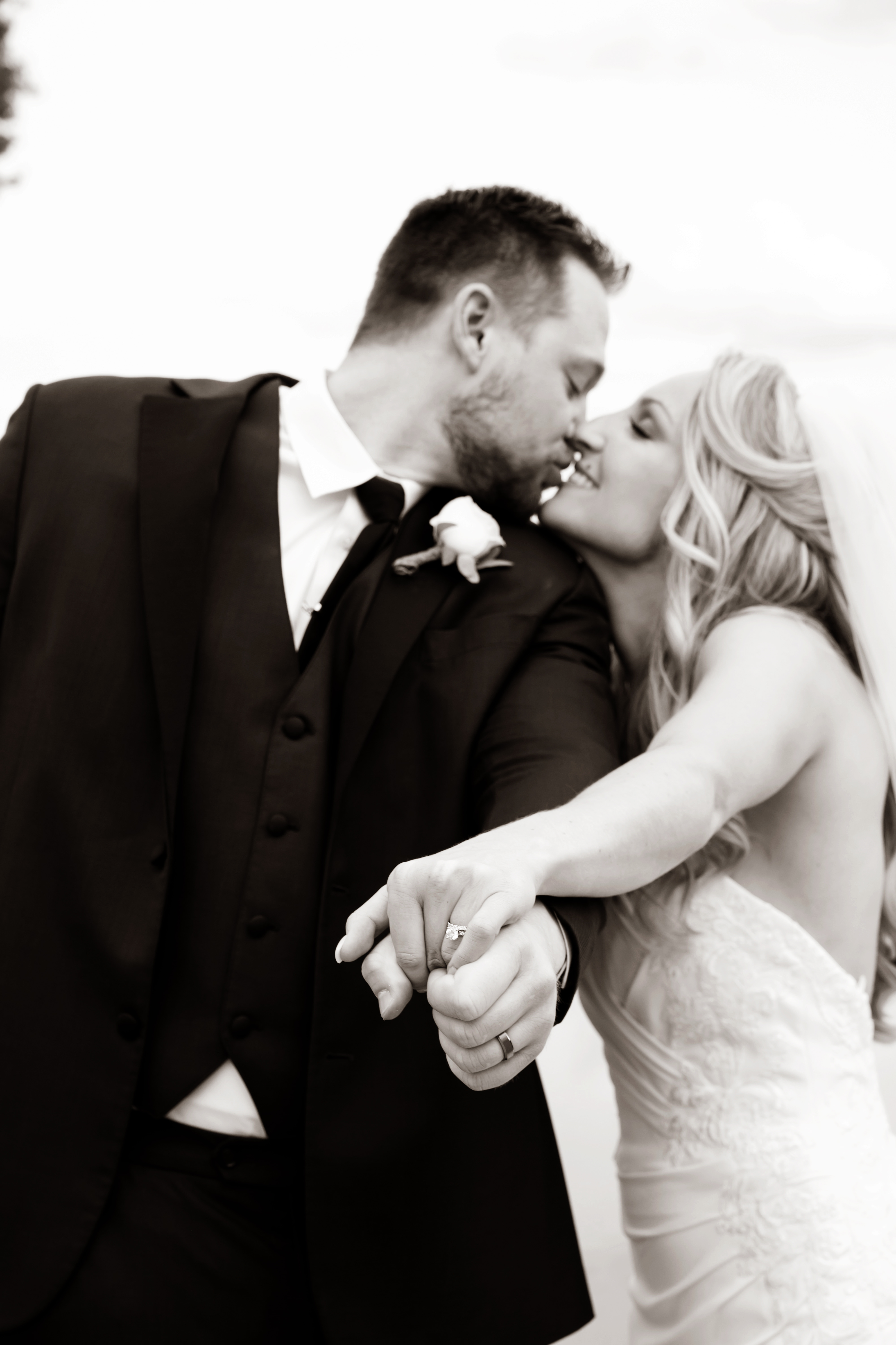 Bride and groom sharing their first kiss